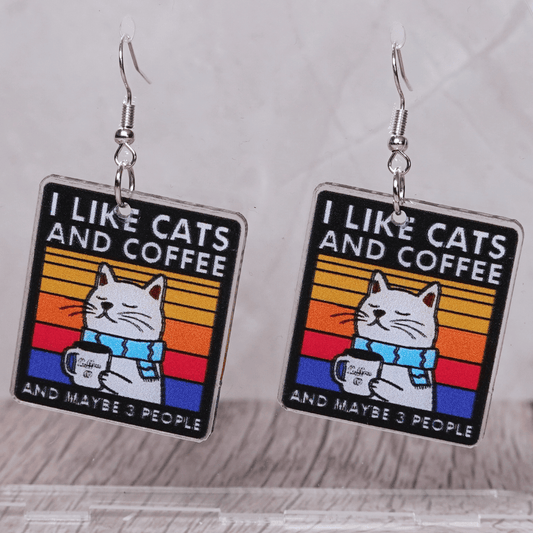 Square dangle earrings with cat holding coffee mug and text “I like cats and coffee and maybe 3 people”