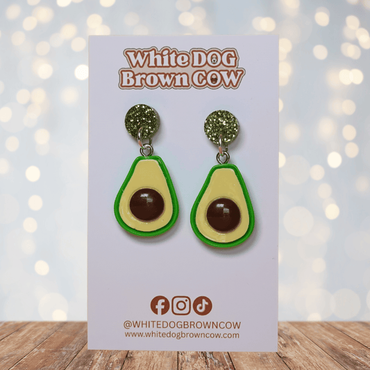 Avocado shaped dangle earrings with green outline, pale yellow center and raised brown pit