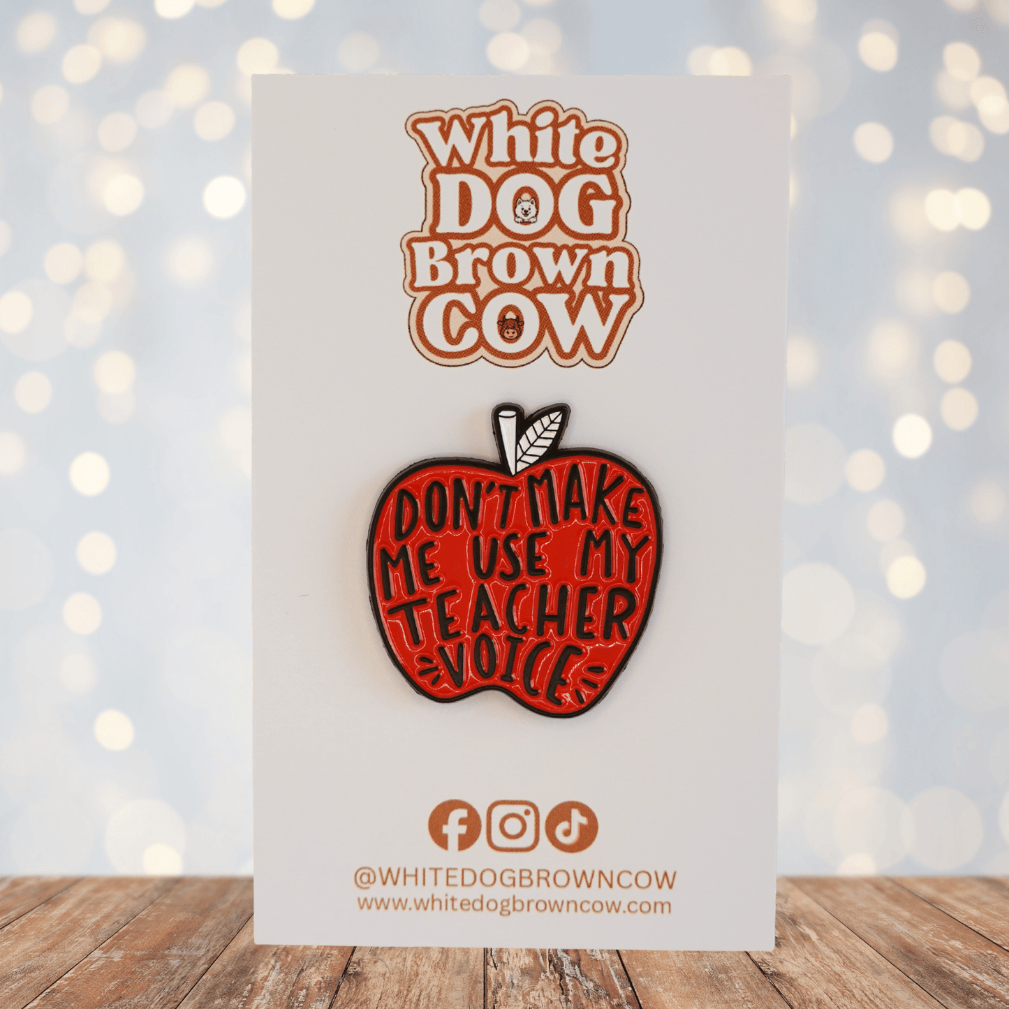 Red apple enamel pin with text βdonβt make me use my teacher voice,β funny teacher gift pin