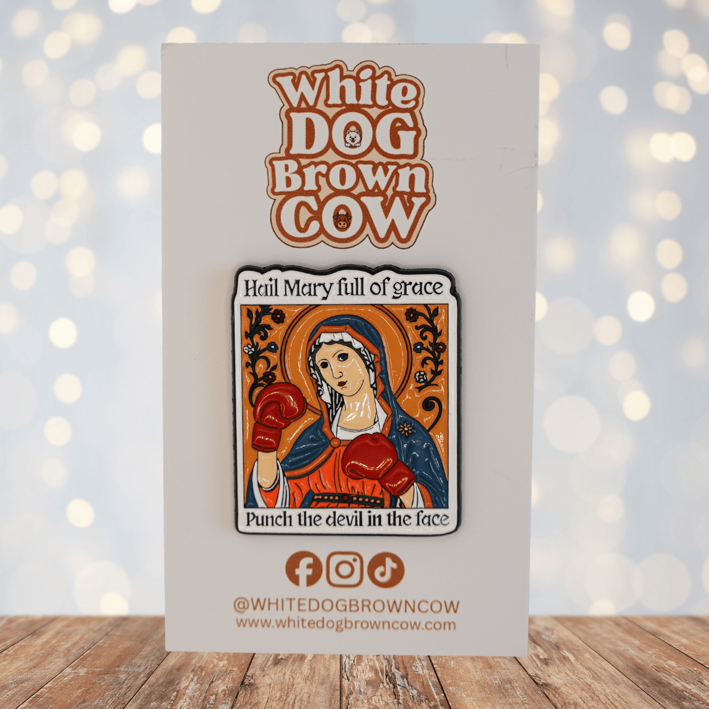 Funny sarcastic Hail Mary punch the devil in the face enamel pin with saint wearing boxing gloves