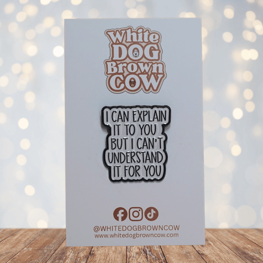 Enamel pin with the quote “I can explain it to you but I can’t understand it for you” in black text on a light background.