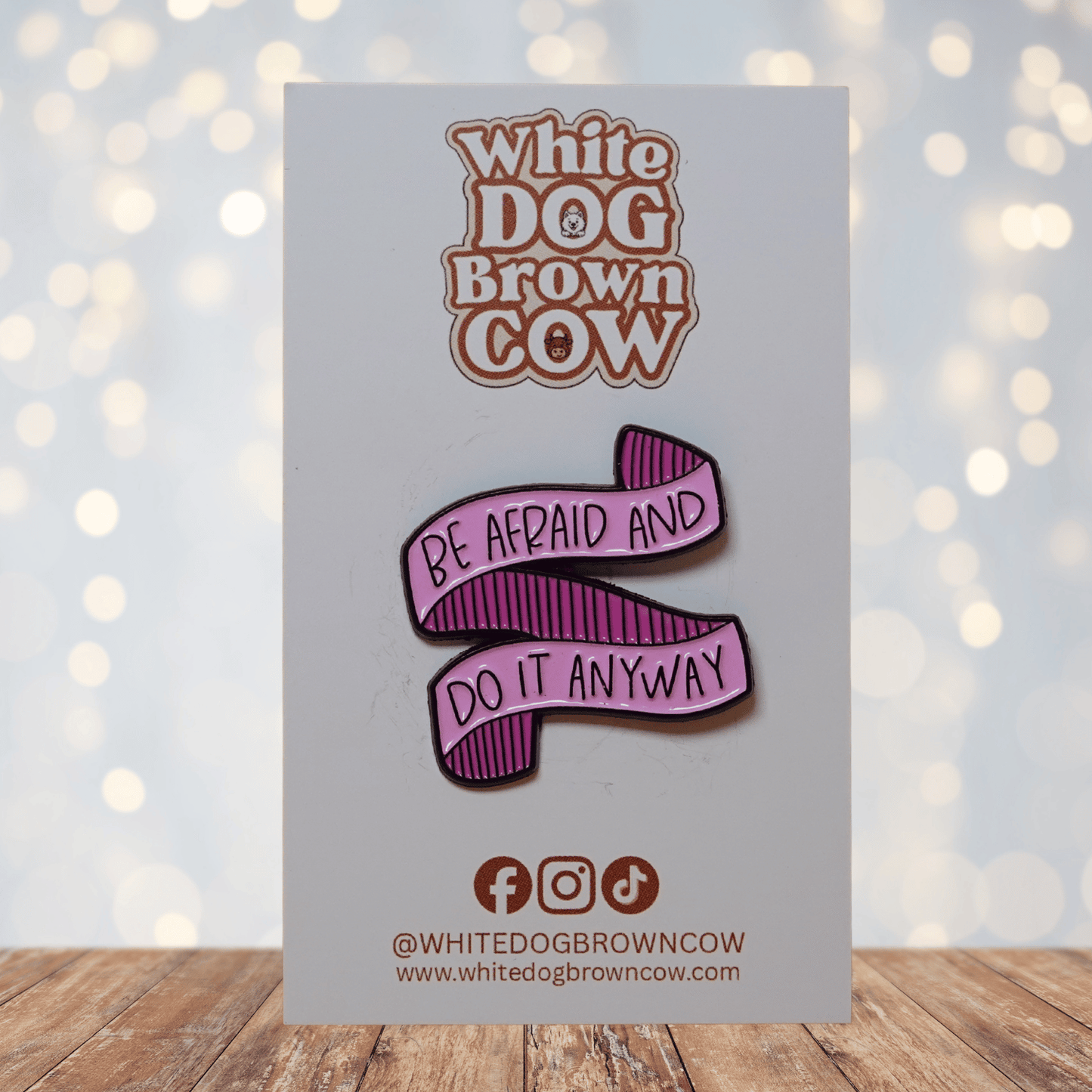 Ribbon enamel pin with the quote “Be Afraid and Do It Anyway,” motivational banner lapel pin.