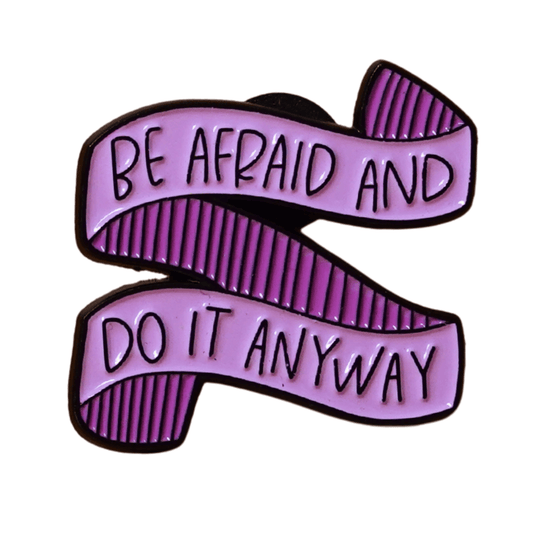 Ribbon enamel pin with the quote “Be Afraid and Do It Anyway,” motivational banner lapel pin.