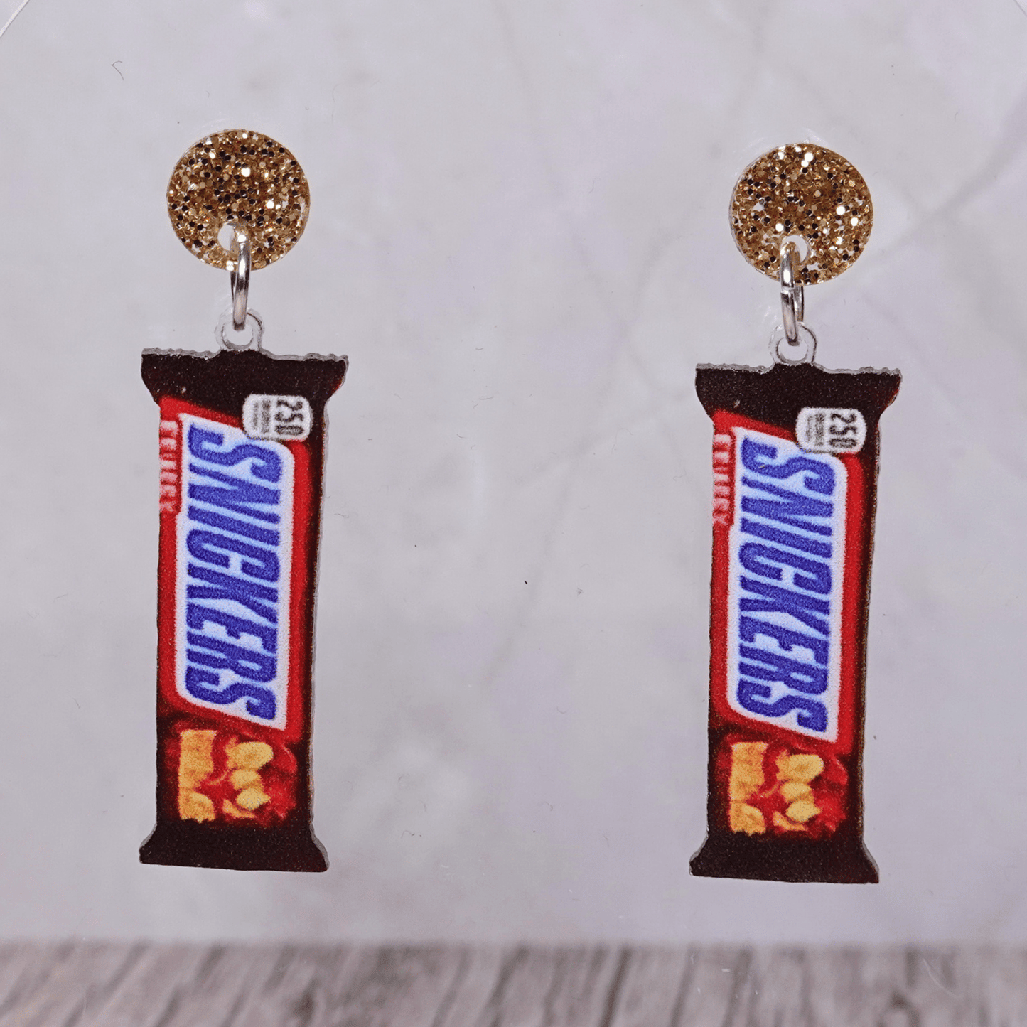 Chocolate bar shaped dangle earrings styled like a wrapped candy bar