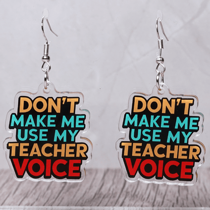 Colorful novelty dangle earrings with text “don’t make me use my teacher voice”