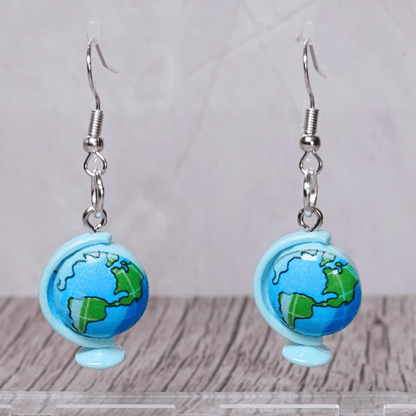 Blue world globe dangle earrings with map design