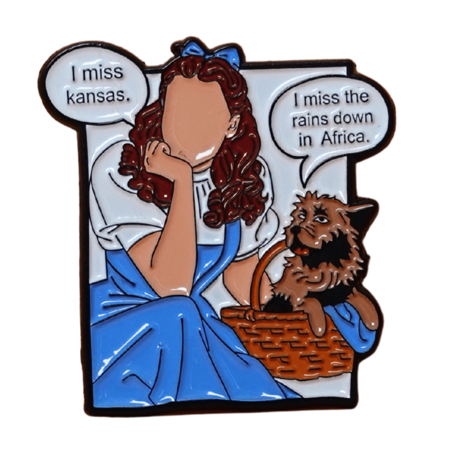 Enamel pin parody of Wizard of Oz with Dorothy and Toto saying “I miss Kansas” and “I miss the rains down in Africa,” funny pop culture mashup lapel pin.