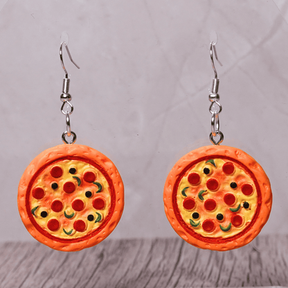 Cute dangle earrings shaped like whole pepperoni pizzas with colorful toppings on a round pizza design.