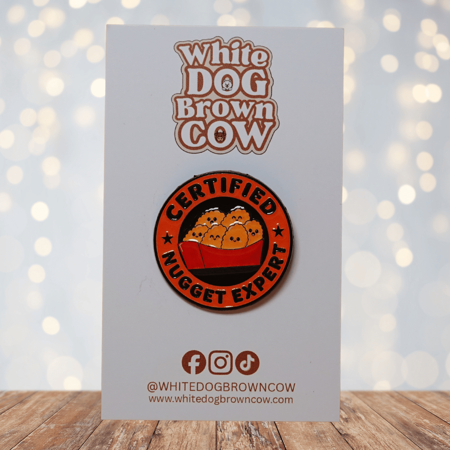 Funny Certified Nugget Expert enamel pin with cute smiling chicken nuggets in a red box, foodie lapel pin gift for nugget lovers.