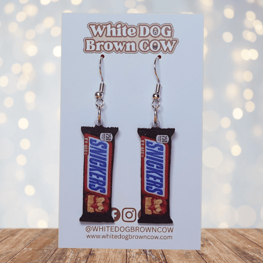 Chocolate bar shaped dangle earrings styled like a wrapped candy bar on silver hooks.