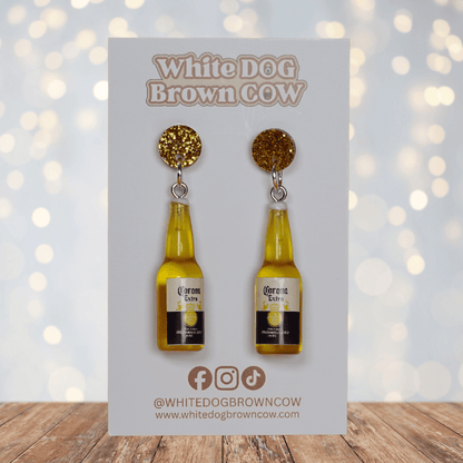 Novelty dangle earrings shaped like small beer bottles