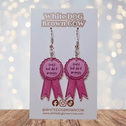 Pink award ribbon dangle earrings with text “cried but did it anyway”