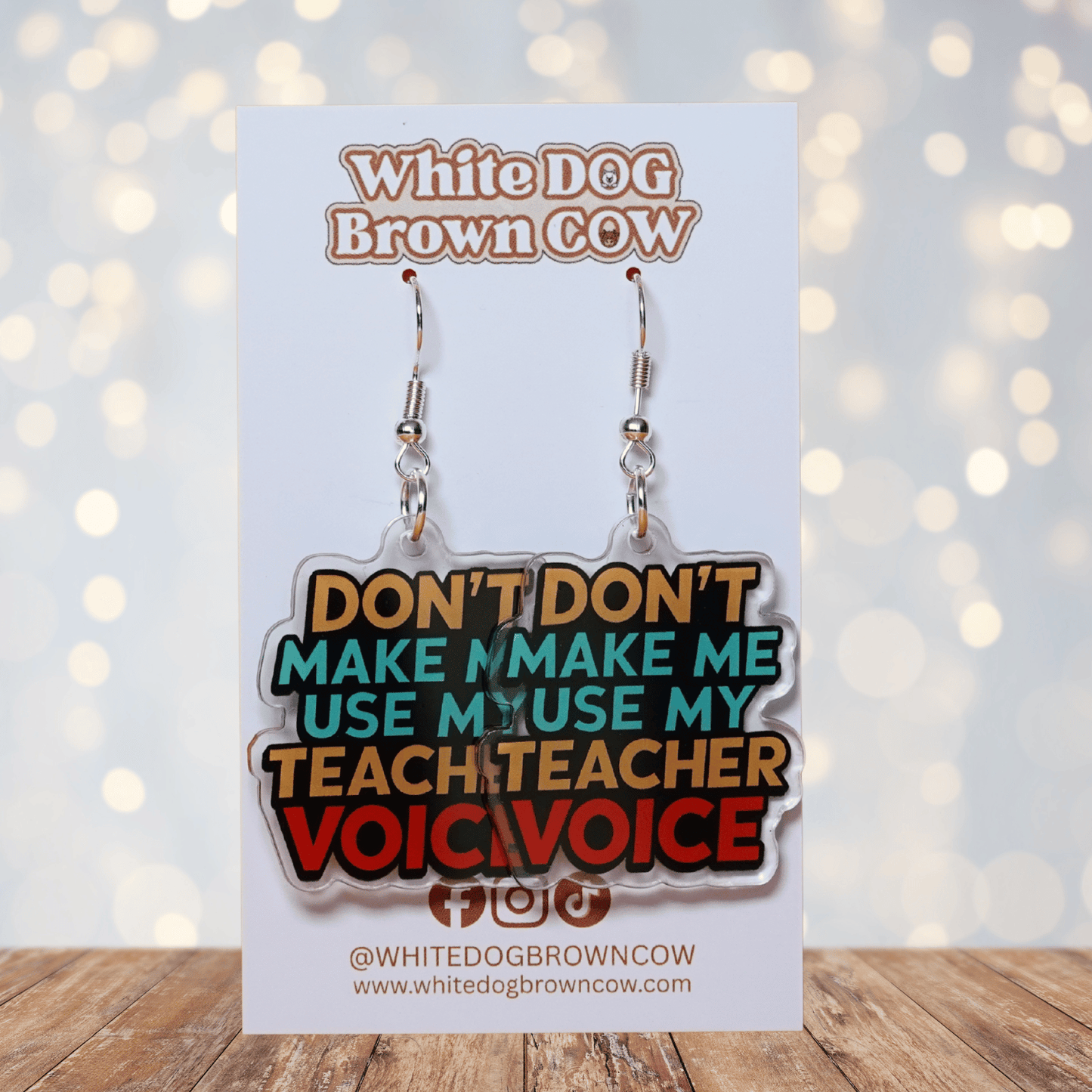 Colorful novelty dangle earrings with text “don’t make me use my teacher voice”