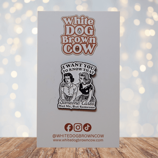 Retro black and white enamel pin with two women illustration and quote “I Want You To Know That Someone Cares, Not Me, But Someone,” sarcastic humor lapel pin.