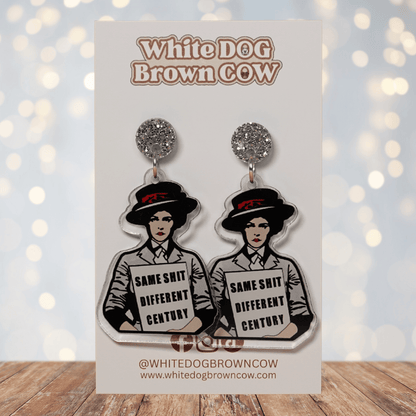 Funny acrylic dangle earrings featuring a vintage-style woman holding a sign that reads “Same shit different century.”
