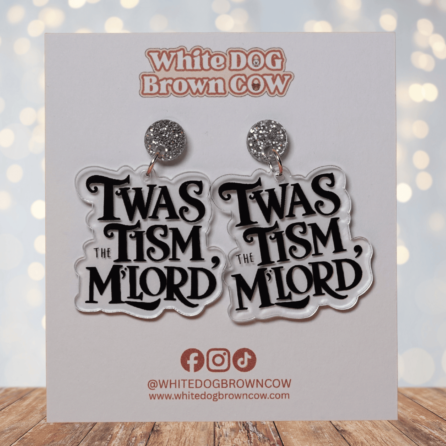 Earrings with 'Twas the Tism, M'lord' design 